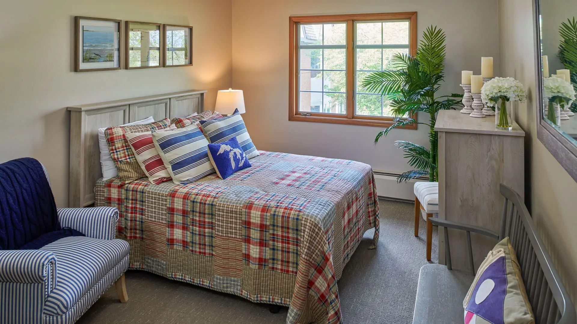 Bedroom of a senior apartment at American House East I, a senior living community in Roseville, Michigan